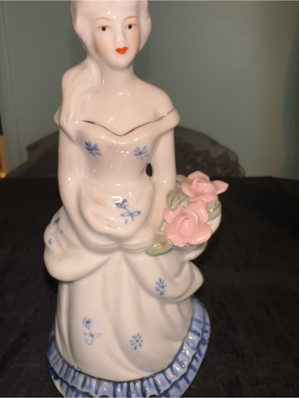 Vintage White Porcelain Lady Figurine with Pink Roses and Blue Accents